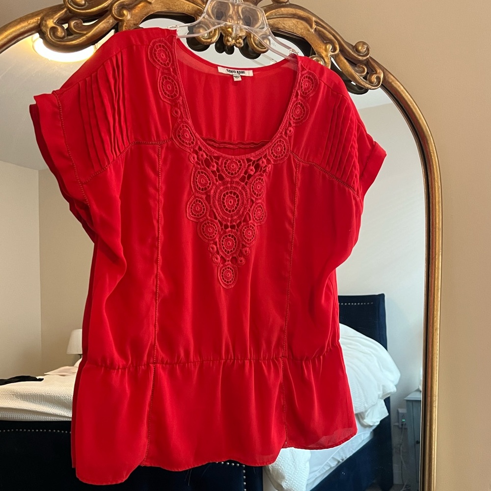 Daniel Rainn coral orange shirt